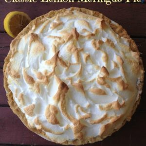 Classic Lemon Meringue Pie -- The perfect slice of lemon pie. Bright, lemony custard baked under a fluffy meringue sure to knock socks off. | thatwhichnourishes.com