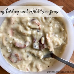 Creamy Turkey and Wild Rice Soup -- the perfect way to use up leftover turkey or a rotisserie chicken. A thick, creamy, flavorful soup garnished with bacon | thatwhichnourishes.com