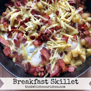 Breakfast Skillet -- Your favorite elements of breakfast (bacon, potatoes and eggs) made in one skillet and covered in cheese. Does it get any better? | thatwhichnourishes.com