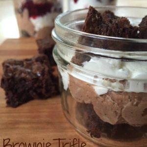 Brownie Trifle -- Layers of chocolatey happiness served as in a trifle bowl to please a crowd, or individual mason jars for a perfect presentation. A delightful pudding layer with extra goodness, whipped cream, and brownies might just make ya famous. | thatwhichnourishes.com