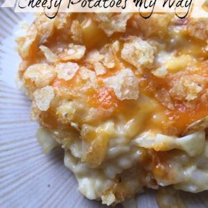 Cheesy Potatoes My Way -- Comfort food at its finest. These beauties are the perfect accompaniment to any campfire foods, potluck tables, alongside sandwiches, or as a dinner side dish. Cheesy goodness is topped with crushed corn flakes or potato chips. | thatwhichnourishes.com
