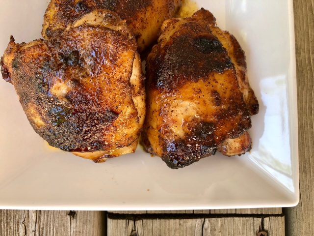 Honey Glazed Chicken Thighs -- Flavored with spices and broiled in under 30 minutes, these inexpensive chicken thighs are caramelized with a honey glaze for a simple and delicious meal! | thatwhichnourishes.com