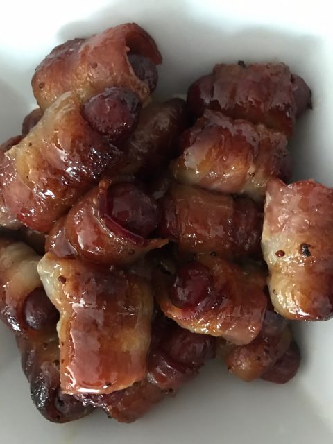 Maple Glazed Bacon Weenies -- Little smokes turn into little bites of drool-worthy yum when they are wrapped in a bacon and caramelized in a sweet and savory maple mustard glaze | thatwhichnourishes.com
