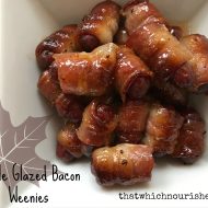 Maple Glazed Bacon Weenies -- Little smokes turn into little bites of drool-worthy yum when they are wrapped in a bacon and caramelized in a sweet and savory maple mustard glaze | thatwhichnourishes.com