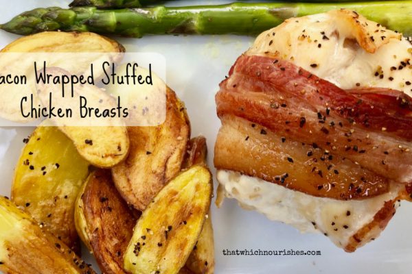 Bacon Wrapped Stuffed Chicken Breasts -- Flavored cream cheese fills a tender chicken breast wrapped in crispy bacon. A simple recipe that is elegant and delicious. | thatwhichnourishes.com