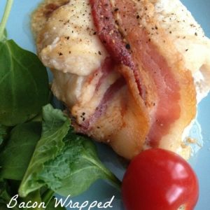 Bacon Wrapped Stuffed Chicken Breasts -- tender chicken stuffed with herbed cream cheese and wrapped in bacon. Easily our family's favorite meal. | thatwhichnourishes.com