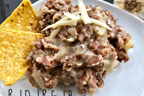 Real Deal Refried Beans -- Real-deal because they are cooked from scratch and flavored with garlic, onions, butter, and bacon to make the thickest, heartiest, most flavorful beans you may have had to date. | thatwhichnourishes.com