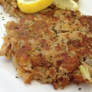 Salmon Patties -- Canned salmon transforms into a crispy, flavorful patty of yum with just a little help from this great recipe. An easy way to sneak salmon into your family's meals in a way they will love. | thatwhichnourishes.com