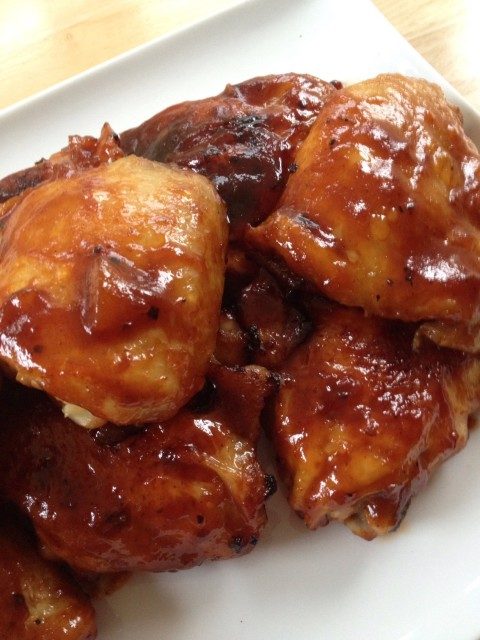 Best BBQ Chicken Thighs -- Juicy chicken thighs dripping with BBQ sauce perfection. Baked so there's no grill-guessing! | thatwhichnourishes.com