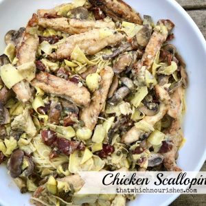 Chicken Scallopini -- Tender pieces of chicken, savory mushrooms, bacon, capers, and artichokes are nestled into pasta and bathed in a garlic, lemon, white wine cream sauce that you may just lick off of your plate. | thatwhichnourishes.com