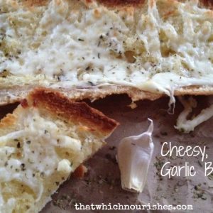 Cheesy, Easy Garlic Bread -- In just a few minutes with just a few simple pantry ingredients, you can make your own garlicky goodness boozing with cheese and spice. | thatwhichnourishes.com