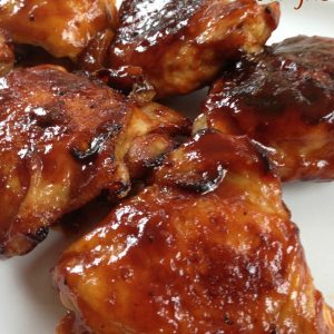 Best BBQ Chicken Thighs -- Juicy chicken thighs dripping with BBQ sauce perfection. Baked so there's no grill-guessing! | thatwhichnourishes.com
