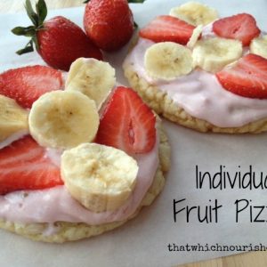 Individual Fruit Pizzas -- These little beauties take traditional fruit pizzas up a notch making them extra delicious with a marshmallow topping and fully customizable. | thatwhichnourishes.com