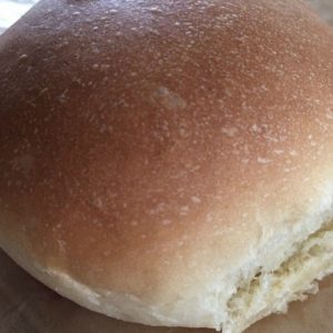 Homemade Hamburger Buns -- It's easier than you think to whip up a batch of buttery, soft homemade hamburger (or hotdog) buns and take your burgers over the top to outstanding |thatwhichnourishes.com
