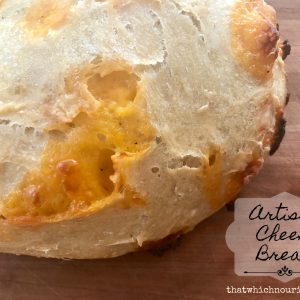 Artisan Cheese Bread -- Crispy on the outside, soft on the inside, this recipe makes two loaves of Artisan Cheese Bread that may be the easiest most amazing bread you've ever had. No kneading needed! | thatwhichnourishes.com