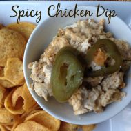 Spicy Chicken Dip --Two cheeses melted in with spices, chicken, and jalapeños to your taste make this dippably perfect with tortilla chips or crackers. | thatwhichnourishes.com