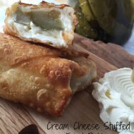 Cream Cheese Stuffed Fried Pickles -- Because what could be better than the crunch of a salty pickle tucked in a blanket of cream cheese and wrapped and fried in healthy oil? Three ingredients and you have an easy showstopper! | thatwhichnourishes.com