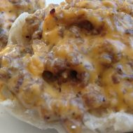 Sausage and Cheese Muffins -- An easy, cheesy appetizer or lunch you can make in minutes with only four delicious little ingredients | thatwhichnourishes.com