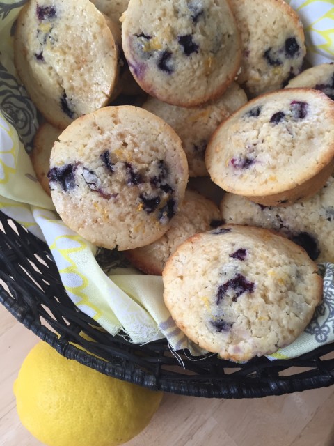 Lemon Blueberry Muffins -- If Lemon Bars and blueberry muffins had a baby, this would surely be it. Super moist muffins packed with tart lemon flavor. | thatwhichnourishes.com | thatwhichnourishes.com
