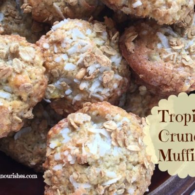 Tropical Crunch Muffins -- Packed with bananas, coconut, and a crunchy granola surprise, these moist and tender muffins are exactly the little escape and ordinary day needs. | thatwhichnourishes.com