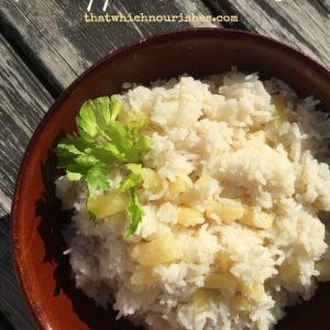 Pineapple Coconut Rice -- Creamy, coconut-y rice with hints of sweetness from pineapple. This easy rice makes a perfect and unique side dish ideal with chicken, fish, or pork. | thatwhichnourishes.com