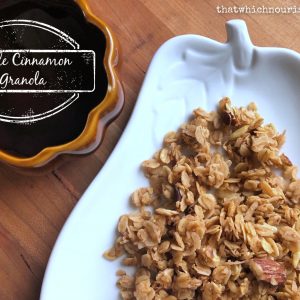 Maple Cinnamon Granola -- You just can't stop eating this stuff! Somewhere between crunchy and chewy, this granola is packed with honey, almonds, oats, coconut oil, and cinnamon -- and a ton of nourishment. | thatwhichnourishes.com