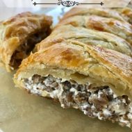 Cheesy Sausage Breakfast Braid -- Creamy cheese and savory sausage meet inside a flaky, buttery pastry to make a simple, yet spectacular breakfast or brunch showstopper. | thatwhichnourishes.com