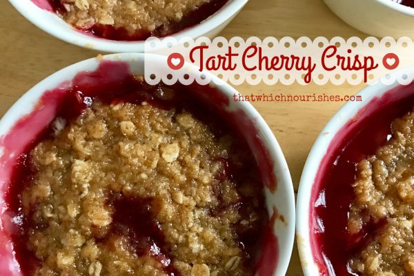 Tart Cherry Crisp -- Warm, tart cherries nestled like a pie under a blanket of crisp topping of oats and brown sugar. | thatwhichnourishes.com