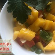 Must-Have Mango Salsa -- A delightful blend of sweet and a bit spicy (totally adjustable to taste) and comes together in minutes. Great on fish or chicken or as a snack! | thatwhichnourishes.com