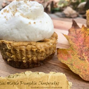 Mini Maple Pumpkin Cheesecakes -- Perfect little creamy maple pumpkin cheesecakes full of all the spices of fall layered over a ginger snap crust and topped with a maple whipped cream. | thatwhichnourishes.com
