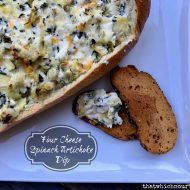 Four Spinach Artichoke Dip == Four cheeses combine perfectly with garlic, spinach, and artichokes to create the very best version of this classic dip we all love. Bake it in a bread bowl for ultimate dipping pleasure. | thatwhichnourishes.com