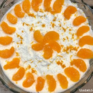 Orange Vanilla Trifle -- Layers of from-scratch goodness in the form of orange pound cake, vanilla pudding, and freshly whipped cream come together to make a creamy, citrusy show-stopping dessert. | thatwhichnourishes.com