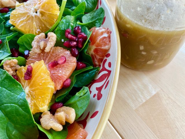 Citrus Salad with Orange Vinaigrette -- This salad combines bright and fresh winter fruits to contrast with crunchy greens in a way that is as beautiful as it is pleasing to your tastebuds. | thatwhichnourishes.com
