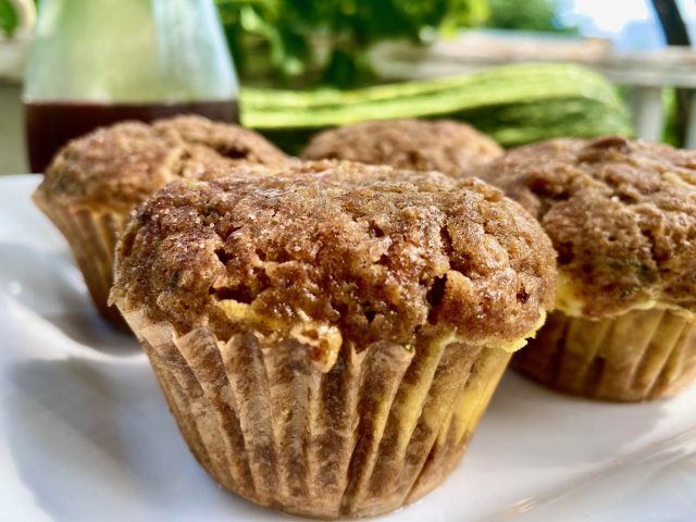 Autumn Spiced Cheesecake Muffins -- Soft, moist muffins spiced with all the warm, Autumn spices and layered with stripe of cheesecake-goodness. Filled with zucchini, carrots, coconut oil, and maple syrup, these beauties are as nourishing as they are delicious! | thatwhichnourishes.com