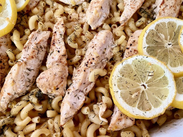 Lemon Chicken Pasta -- Buttery, bright, and beautiful in its simplicity, this pasta dish comes together in minutes starting with uncooked pasta, chicken, and lots of lemon baked in one dish! |thatwhichnourishes.com