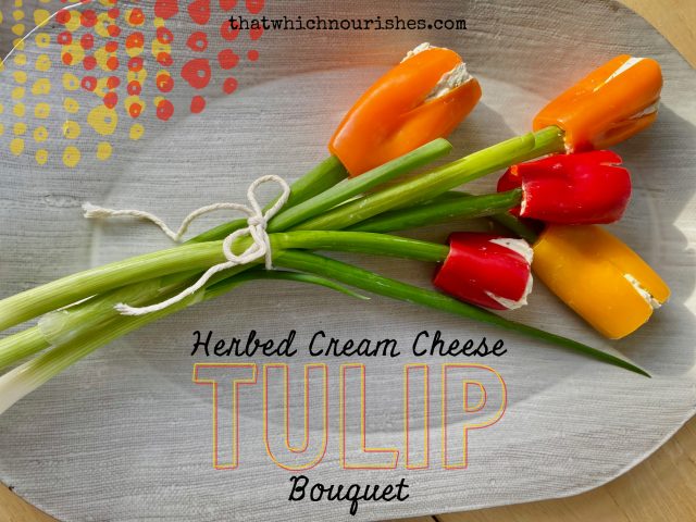 Herbed Cream Cheese Tulip Bouquet -- Peppers or cherry tomatoes stuffed with the perfect herbed cream cheese mixture are given green onion stems and transformed into a beautiful bouquet! | thatwhichnourishes.com