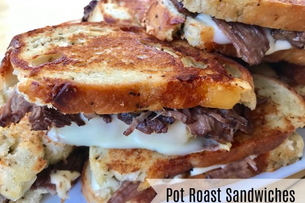 Pot Roast Sandwiches -- Tender beef roast made in the crock pot and piled onto sandwiches with goozy cheese and grilled to sandwich perfection! | thatwhichnourishes.com