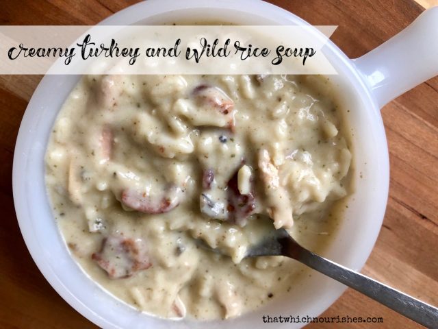Creamy Turkey and Wild Rice Soup -- the perfect way to use up leftover turkey or a rotisserie chicken. A thick, creamy, flavorful soup garnished with bacon | thatwhichnourishes.com