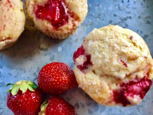 Strawberry Cream Cheese Muffins -- Cream cheese makes these muffins special with a softer, lighter texture than other muffins. Strawberries take them over the top to make them the best muffins you'll ever eat. | thatwhichnourishes.com