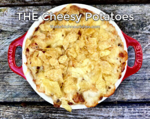 Cheesy Potatoes My Way -- Comfort food at its finest. These beauties are the perfect accompaniment to any campfire foods, potluck tables, alongside sandwiches, or as a dinner side dish. Cheesy goodness is topped with crushed corn flakes or potato chips. | thatwhichnourishes.com
