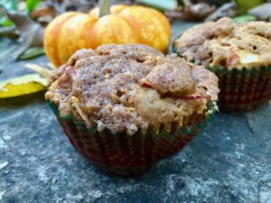 Pumpkin Apple Streusel Muffins -- All the fall flavors come to life in these pillowy soft pumpkin muffins studded with chunks of baked apple and blanketed with a drool-worthy streusel topping. | thatwhichnourishes.com