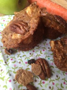 Apple Bran Muffins -- Loaded with all nourishing and yummy things like apples, raisins, carrots, and buttermilk, these super moist muffins are hearty and filling and perfectly sweet. | thatwhichnourishes.com