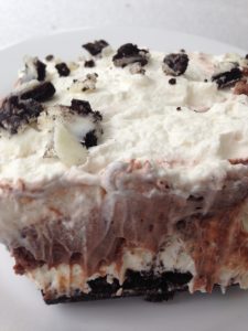 Chocolate Layer Dessert -- With a chocolate sandwich cookie crust and layers of homemade whipped cream and chocolate pudding, this dessert is a crowd-pleaser every single time. | thatwhichnourishes.com