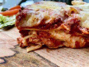 THE Lasagna -- Rich and cheesy and easy to throw together, and the two meats in the meat sauce give it that little extra something that brings this up to a new level of lasagna love.| thatwhichnourishes.com