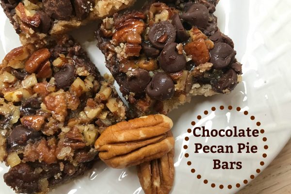 Chocolate Pecan Pie Bars -- Gooey pecan pie filling with the added benefit of rich chocolate. Just like chocolate pecan pie but happier as it's easier to serve! | thatwhichnourishes.com