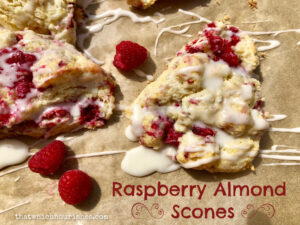 Raspberry Almond Scones -- soft, moist, buttery scones studded with fresh raspberries and blanketed in a sugary glaze | thatwhichnourishes.com