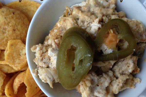 Spicy Chicken Dip --Two cheeses melted in with spices, chicken, and jalapeños to your taste make this dippably perfect with tortilla chips or crackers. | thatwhichnourishes.com