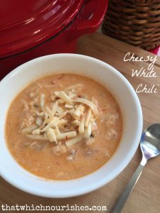 Cheesy White Chili -- Cheesy, rich, slightly spicy white chili. Loaded with white beans, chili, and pepper jack cheese, this is how you do winter comfort food! | thatwhichnourishes.com