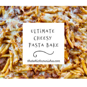 Ultimate Cheesy Pasta Bake -- Meat and pasta meet prepared red sauce, mozzarella, and seasonings and with a quick mix and bake you have gooey, cheesy yum. | thatwhichnourishes.com