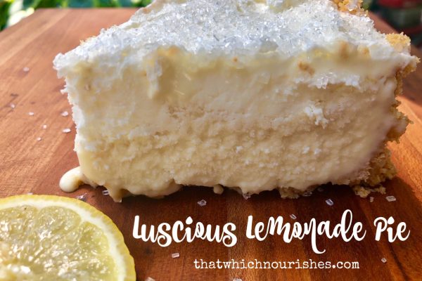 Luscious Lemonade Pie -- A tart, creamy lemonade flavored filling is piled high inside a buttery graham cracker crust and kept in the freezer for that day when you just need perfect pie. | thatwhichnourishes.com